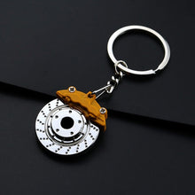 Load image into Gallery viewer, Cute Metal Auto Parts Disc Brake Shock absorber Keychain Hub Calipers Key Ring For Car Pendant
